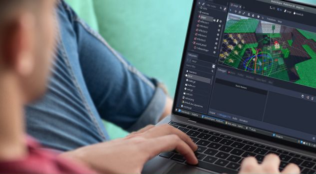 boy working on godot game design