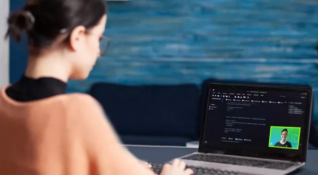 girl working on javascript with virtual tutor