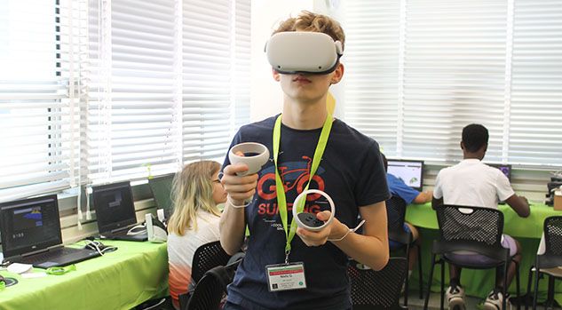 boy with meta quest at vr summer camp